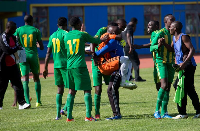 AS Kigali players celebrate after their penalty shoot-out win over APR in the semi-final. rn(T. Kisambira)