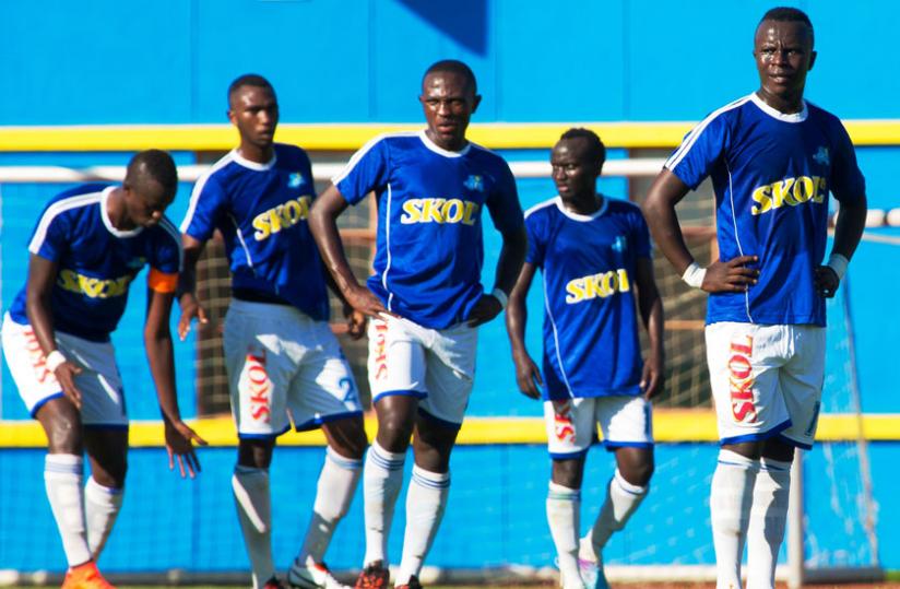 Rayon players look dejected following the loss to Police in the Ombudsman Cup this month. The club has not paid players for two months. (Timothy Kisambira)