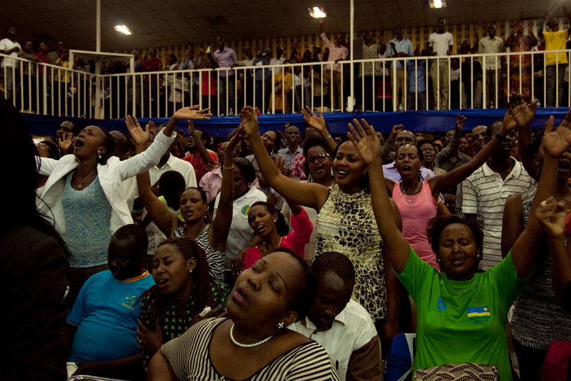 Faithful at Zion Temple pray at the onset of the New Year. (Faustin Niyigena)