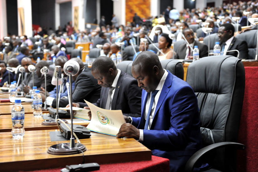 Former mayor of Gasabo District  Willy Ndizeye, signs Imihigo at Parliament last year. (File) 