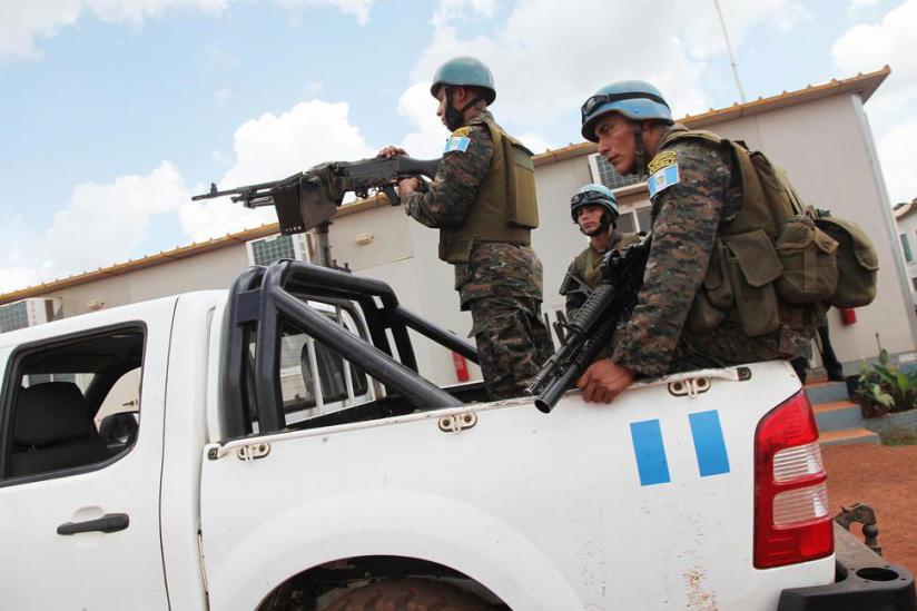 Monusco peacekeepers patrol a street in Eastern DR Congo.