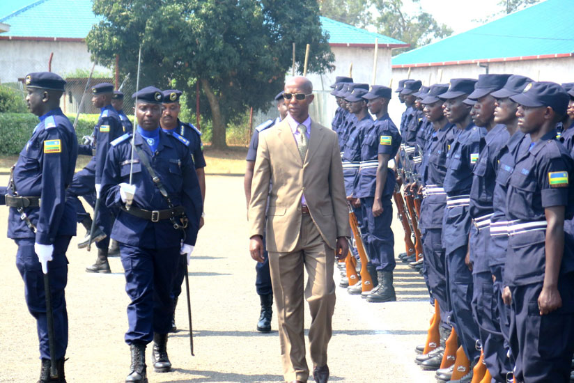 Harerimana inspects a Police parade at the ceremony in Rwamagana District yesterday. (Stephen  Rwembeho)