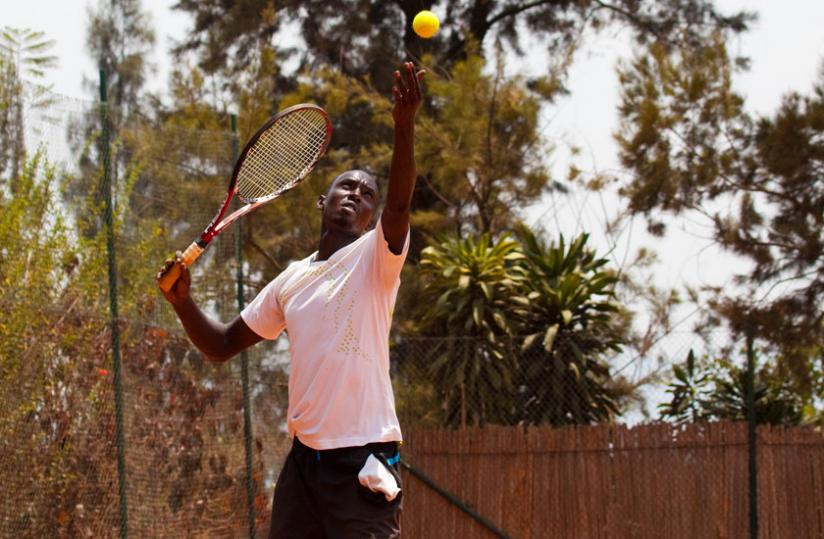 Jean Claude Gasigwa during training at Umubano tennis court. The tennis ace died suddenly during a training session yesterday. (Timothy Kisambira)