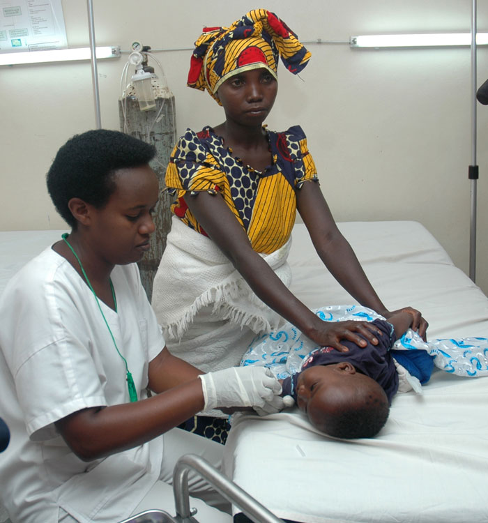 A nurse attends to a sick child at CHUK in 2013. (File)