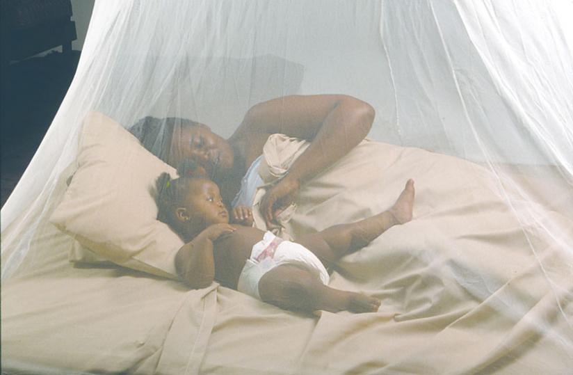 A mother and her child sleep under a mosquito net. Incidences of malaria infection have increased in some parts of the country. (File)