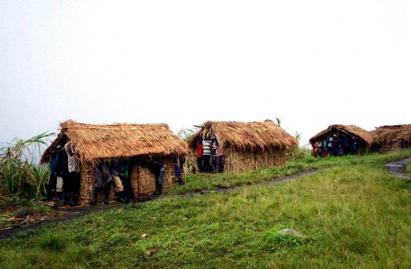 FDLR militia shelter from rain in huts outside their headquarters in Buleusa, North Kivu. (File)