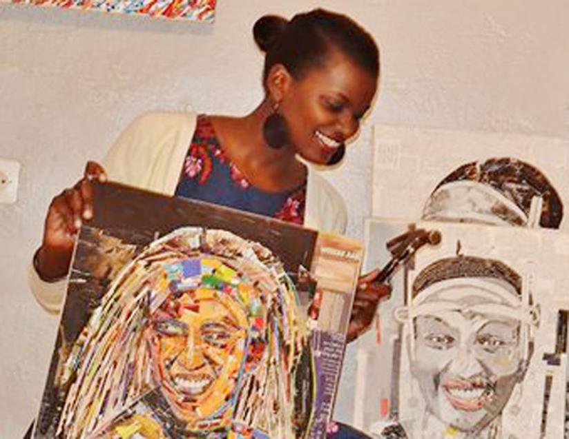 Crista Uwase displays some of her art work.