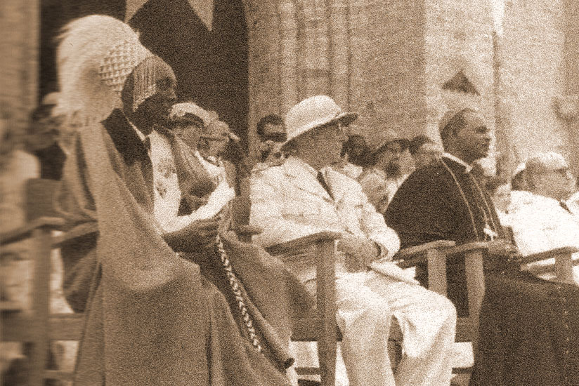 King Mutara III Rudahigwa (L) at a function with an unidentified guest (C) and Bishop Bigirumwami. (Courtesy)