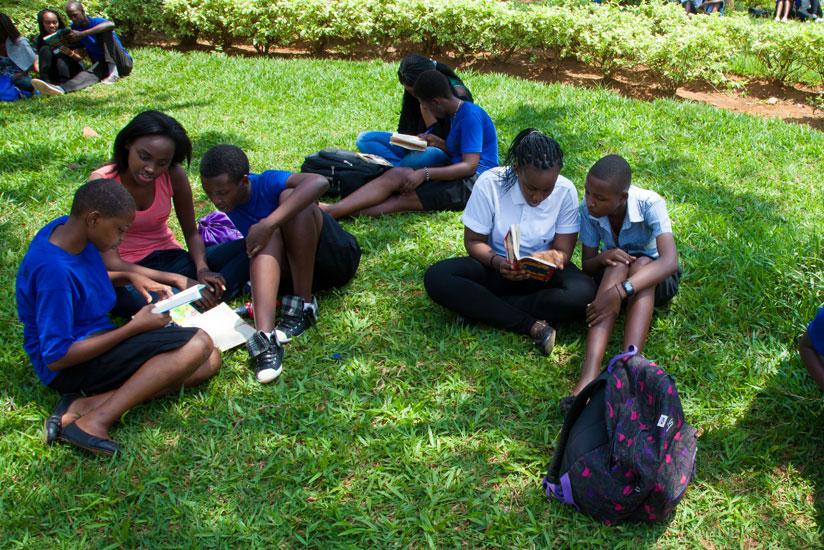 Students from Green Hills Academy and Nyamata High School read together on Reading Day. The goal of Agnes Gyr-Ukunda is to promote the reading in Rwanda. (Courtesy)