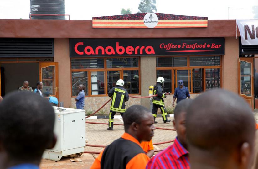 Police try to contain a fire at Canaberra restaurant in Remera in October last year.  (John Mbanda)