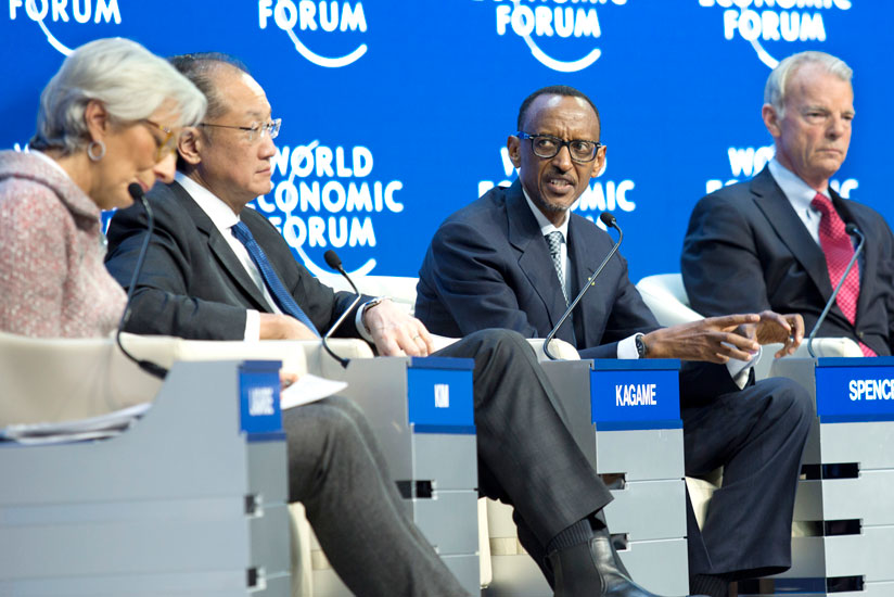 President Kagame contributes at the panel discussion that also included Lagarde (L), Yong Kim (2nd L) and Spence (R) at Davos Summit in Switzerland yesterday. (Village Urugwiro)