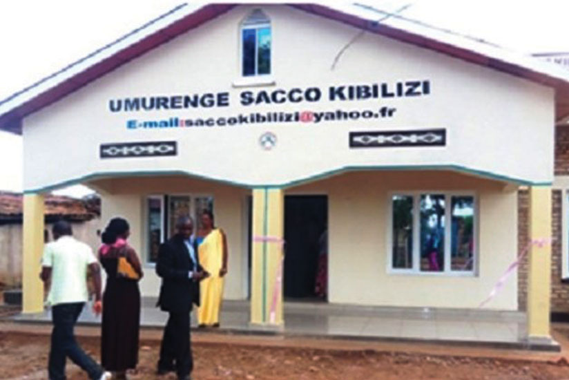 Kibilizi Umurenge Sacco customers. Prohibitive rates are discouraging borrowing among small businesses.