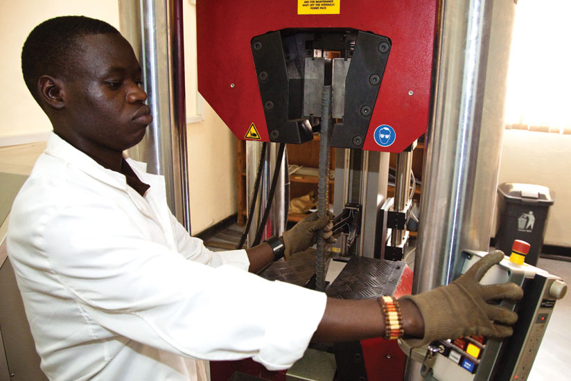 A standards official tests an iron bar for quality. Rwanda Standards Board it is working  with REB on the possibility of introducing studies on standards in schools. (File)