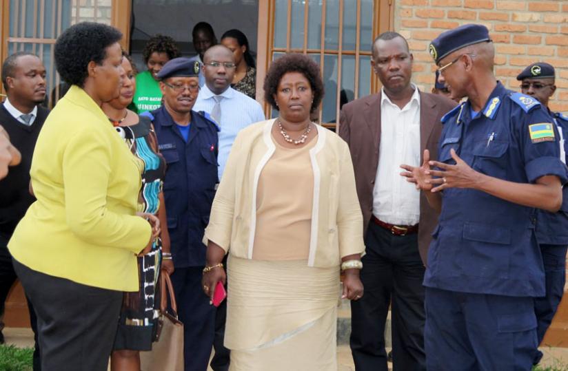 Ministers Gasinzigwa (L) and Dr Binagwaho (C) and other officials on a guided tour of the rehab centre in Huye yesterday. (J.P. Bucyensenge)