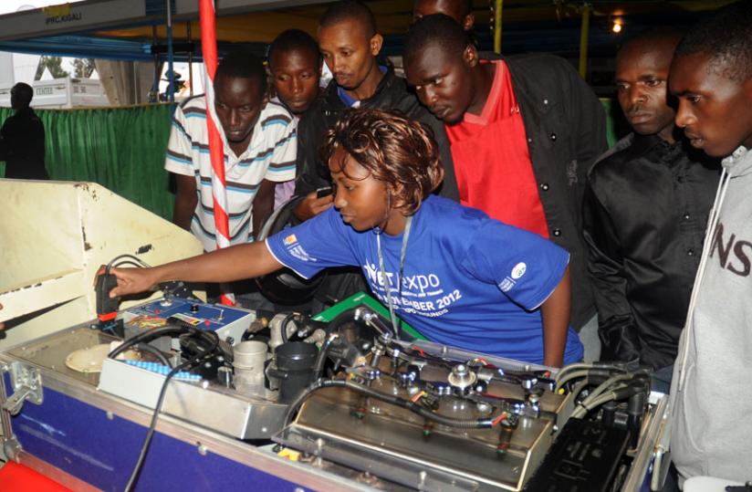 A student of mechanical engineering explains how an engine works during a TVET expo in Kigali in 2012. (File)
