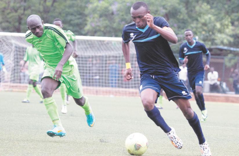 Police FC captain Jaques Tuyisenge (R), seen here in action during a league game against Kiyovu. The striker wants immediate response from his team after a shock 1-0 defeat to Gicumbi. (File)
