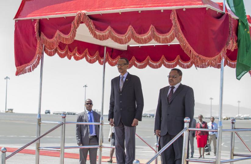 President Kagame salutes the National Anthem played in his honour on arrival in Addis Ababa for the 24th African Union Heads of State and Government Summit yesterday. (Village Urugwiro)