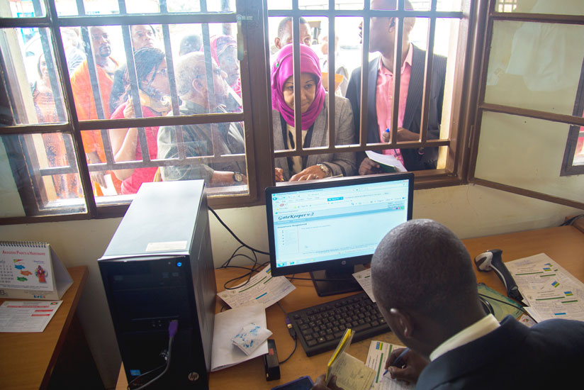 Travellers clearing at Nemba border post. (Timothy Kisambira)
