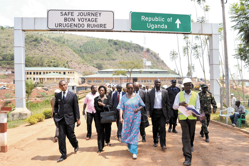 The Minister for East African Community Affairs, Valentine Rugwabiza (C), together with other government officials at Kagitumba. (Courtesy)