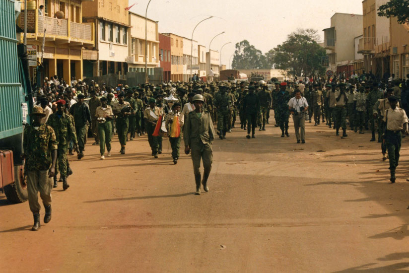 RPA troops walk in Kigali after the fall of the capital in 1994. (Courtesy)