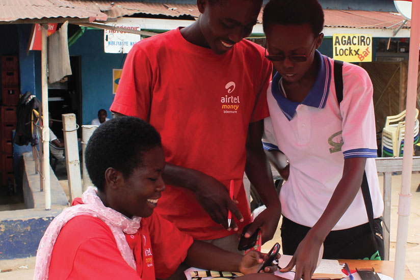 Airtel Money agents serve a customer in Kicukiro. (File)