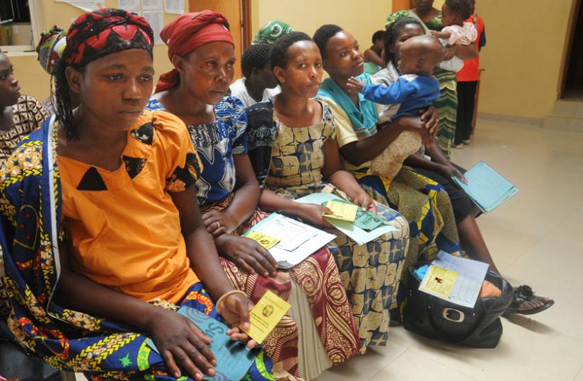Mothers with Mutuelle cards await for medical service at a health facility. (File)