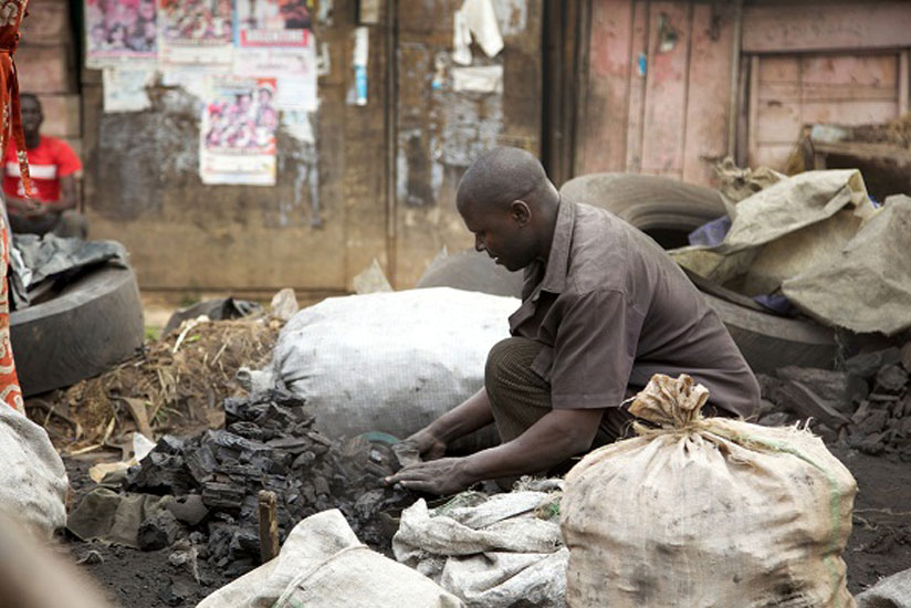 A man sells charcoal. Charcoal is affordable for the majority. (File)
