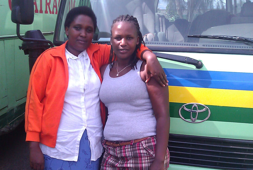 Mukagihana (L) and Mukantazinda while on duty. (Hassan Mutuhe)