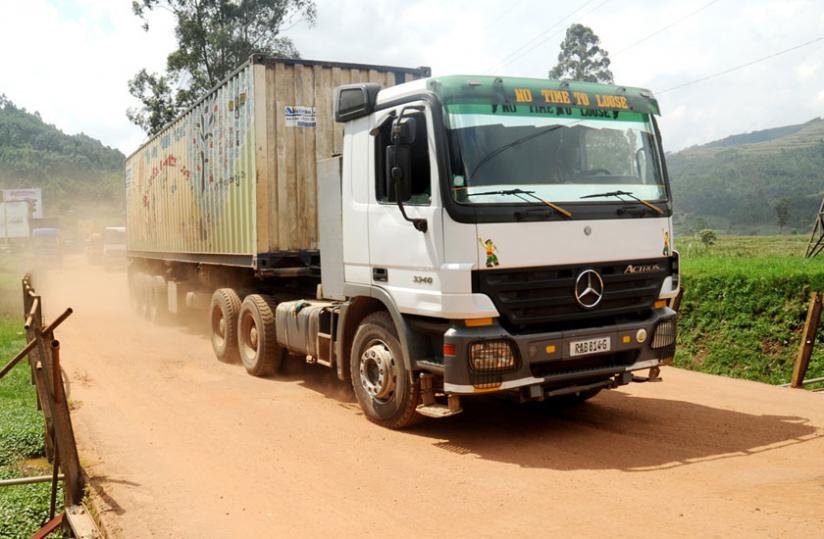 A Rwandan registered truck rumbles across Gatuna border from Uganda in 2013. Expired licences are proving a pain to crossborder truckers. (File)