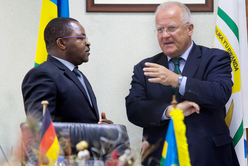  Amb. Fahrenholtz (R) chats with Munyeshyaka at the Ministry of Local Government headquarters in Kigali after the signing ceremony yesterday. 