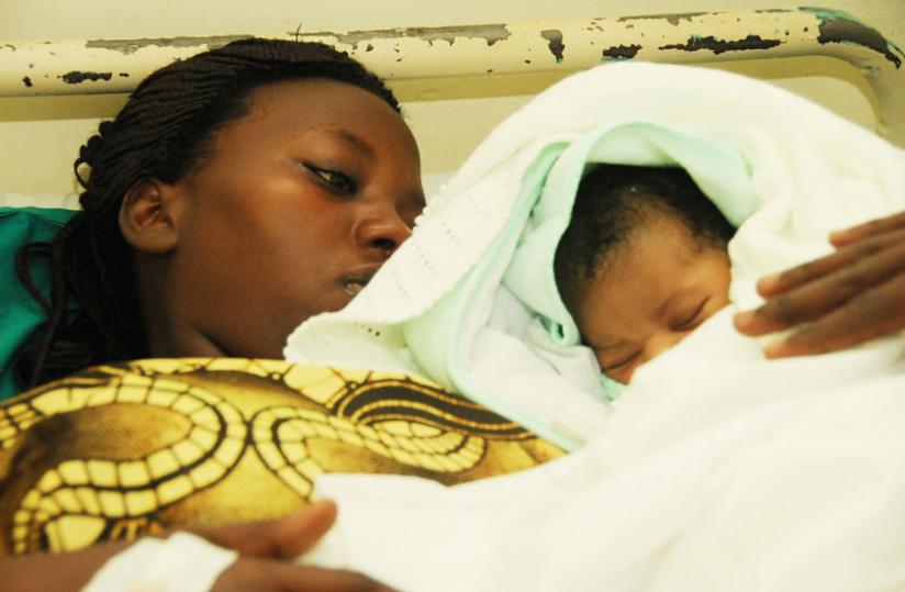 A lady with her newborn baby.(File)