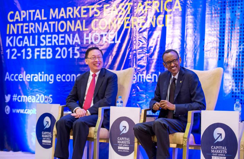 President Kagame and Jingdong Hua, vice-president and treasurer of the International Finance Corporation, at the official opening of the conference on capital  markets in Kigali yesterday. (Village Urugwiro)