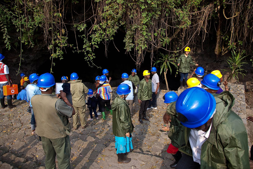 Tourists are briefed before their tour of Musanze Cave last year. (T. Kisambira)