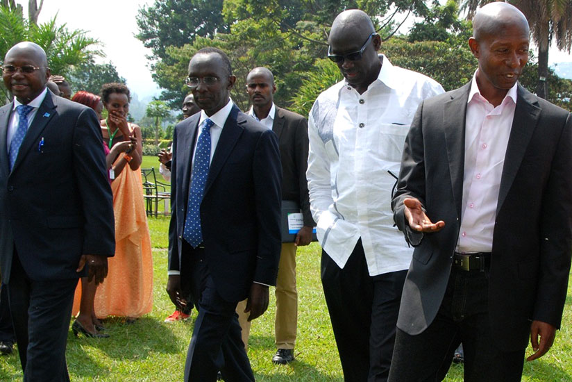 L-R; Manneh, Prof. Rugege, Busingye and Internal Security minister Fasil Harelimana. (J. Mbonyinshuti)