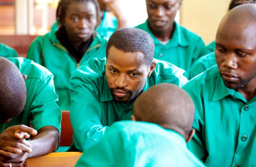 Joel Mutabazi (C) and other co accused during an FDLR-linked terror trial. The case brought to light connections between FDLR and South Africa-based RNC. (File)