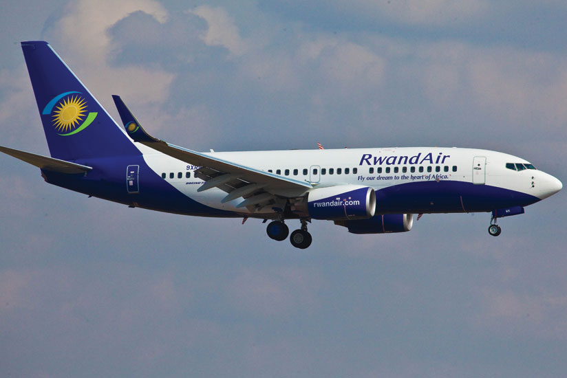 A RwandAir 737-700 plane approaches Kigali International Airport. The airline will extend its operations to Lusaka, Zambia next month. 