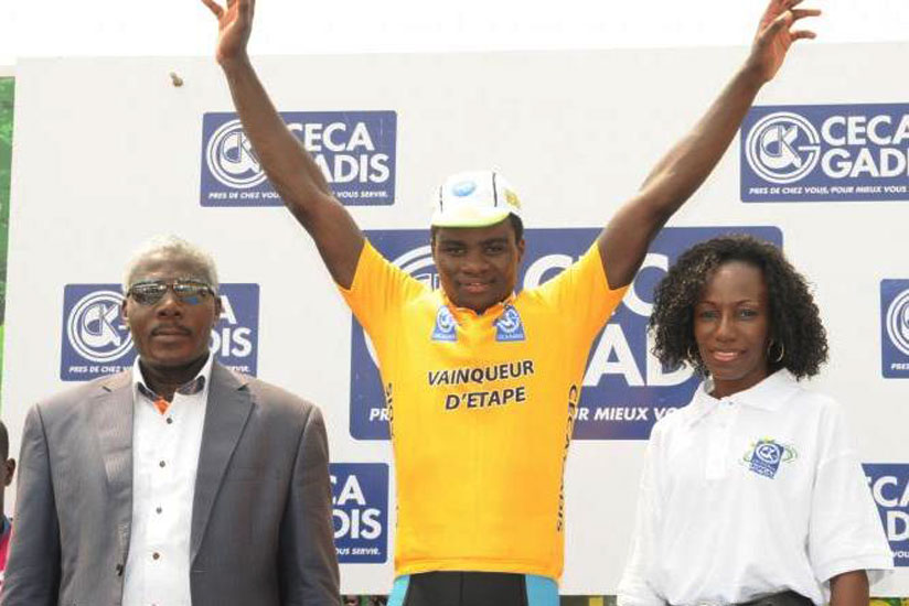 Uwizeyimana celebrates on the podium after winning stage 4 in last year's La Tropicale Amissa Bongo race. He finished 4th on the opening stage of this year's race. (File)