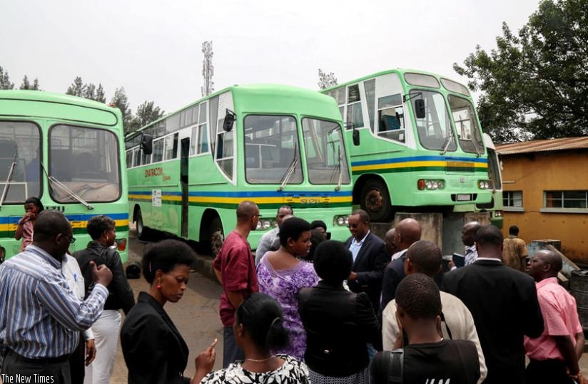 PAC members assess the fleet of buses during their visit to Onatracom yesterday. (Timothy Kisambira)