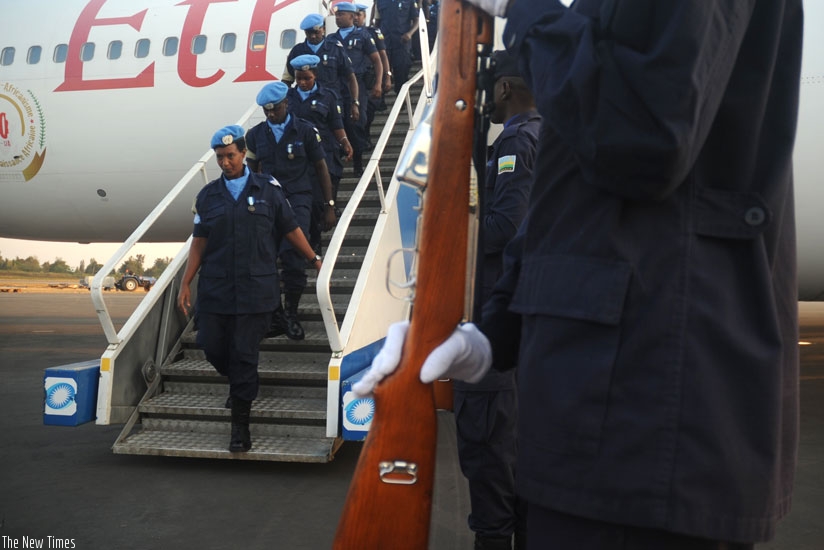 A female police officer returns from a peacekeeping mission. (File)