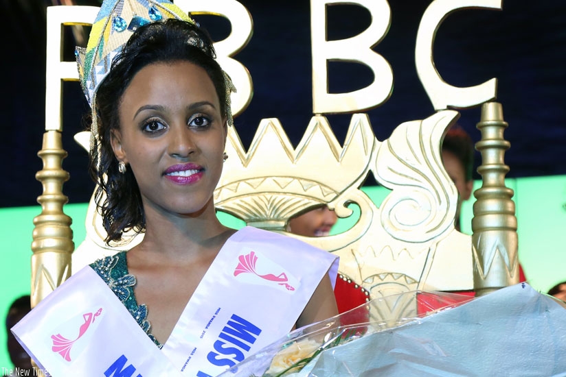 Doriane Kundwa sits in the queen's chair after being crowned Miss Rwanda 2015. (John Mbanda)