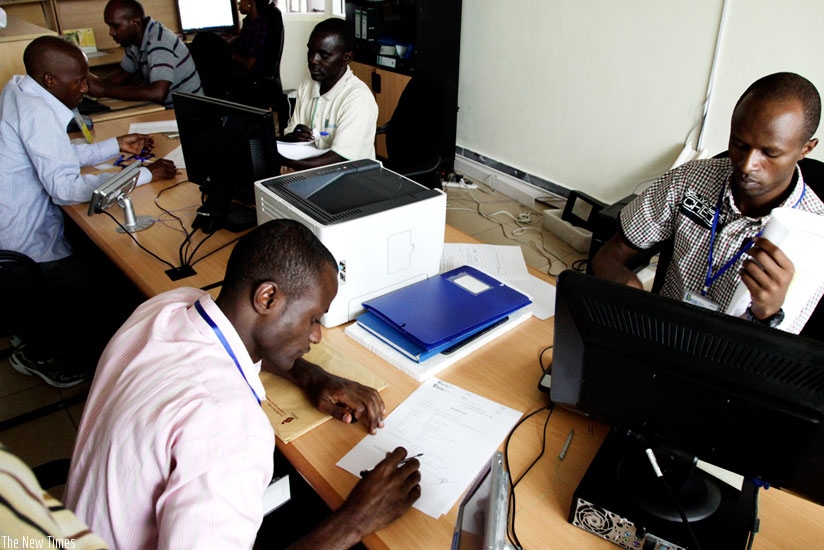 People register businesses at Rwanda Development Board. The Investment Code is expected to balance trade deficits in the country. (File)