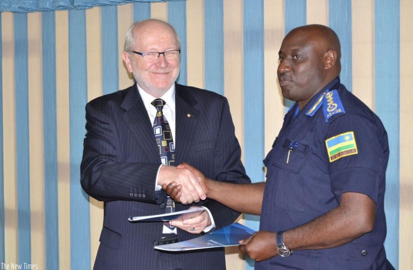 Inspector General of Police, Emmanuel K. Gasana and Prof. James Mcwha, the Vice Chancellor of UR after signing the MoU yesterday. (Courtesy)