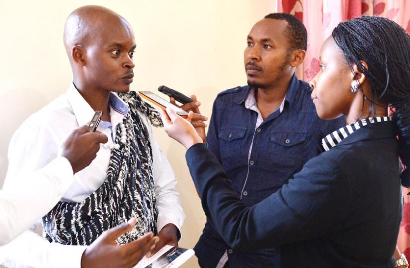 Boshya speaks to journalists at the launch of his book in Kigali yesterday. (Courtesy)