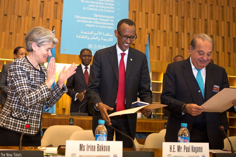 President Kagame and Carlos Slim receive Unesco 70th Anniversary award from Irina Bokova, DG of Unesco, in Paris yesterday. (Village Urugwiro)