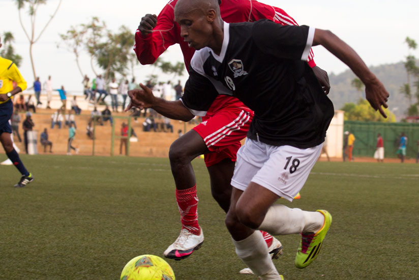 Jamal Mwiseneza battles with an Espoir defender during a previous national league match. (File)