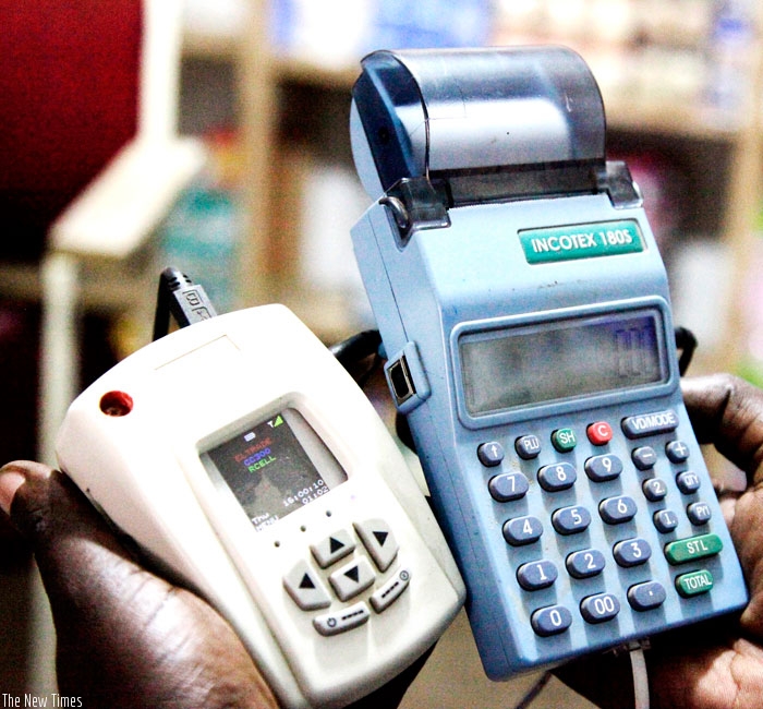An electronic payment device like this one records all transactions and VAT due to the tax body for every item sold. (File)
