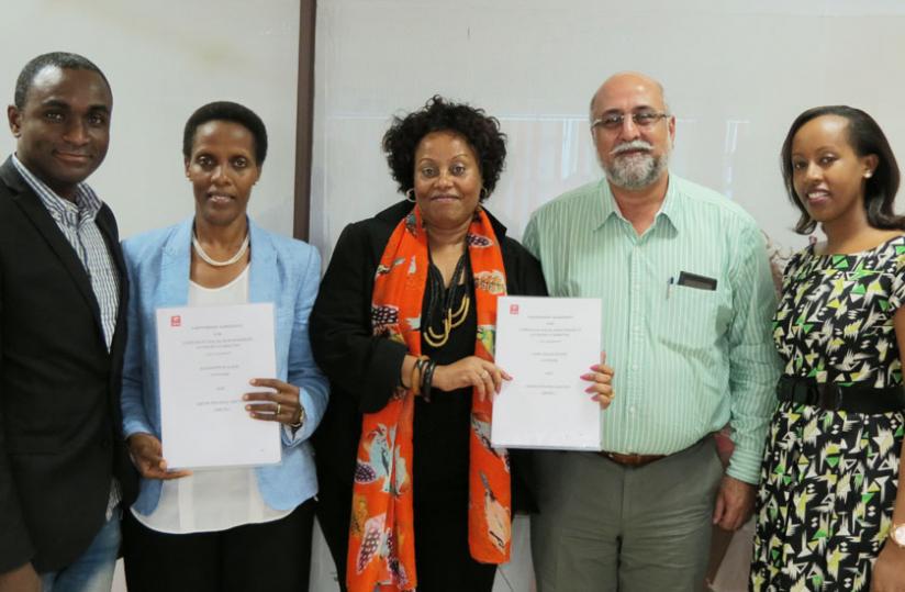 (L-R) Oware, Rugege, Balikungeri, Bhullar and Umunyana pose for a picture after the committee members received their appointment letters. (Ben Gasore)