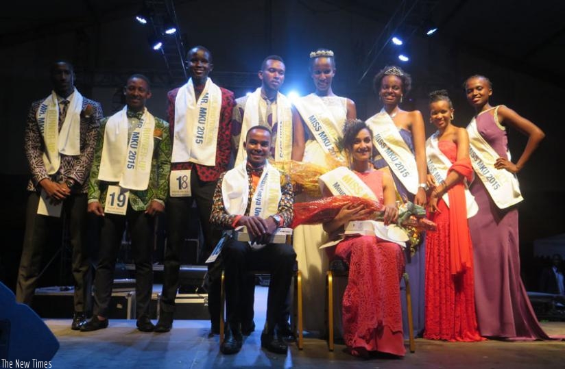 Newly crowned Mr and Miss Mount Kenya University, Ismail Nsengiyumva, and Farid Nadia Agasaro pose for a photo with runners-up. (Stephen Kalimba)