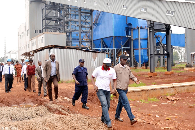 Prime Minister Anastase Murekezi and other officials tour the Gishoma Peat Power Plant in January. (Courtesy)