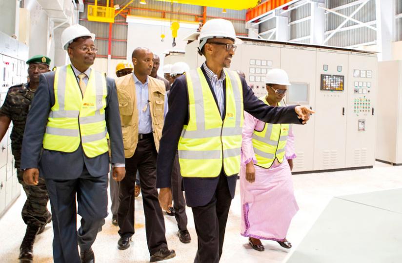 President Kagame and Infrastructure minister James Musoni tour the Nyabarongo I hydro-electric power plant in Muhanga yesterday. (Village Urugwiro)